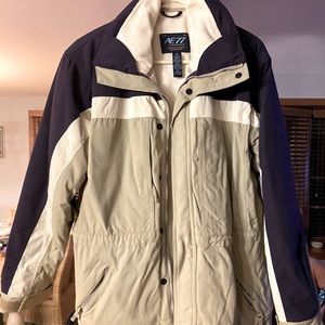 American Eagle winter ski jacket. Beige and purple.